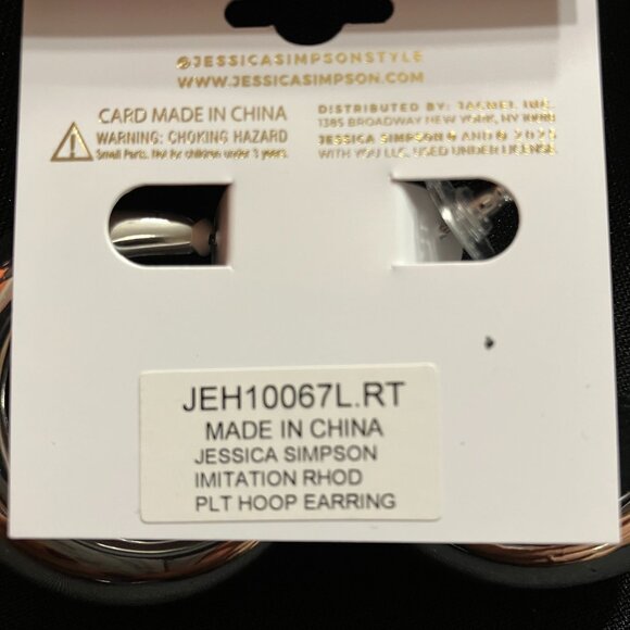 Jessica Simpson Chunky Silver Hoop Earrings Featuring a Distinctive Oval Design - Picture 2 of 4